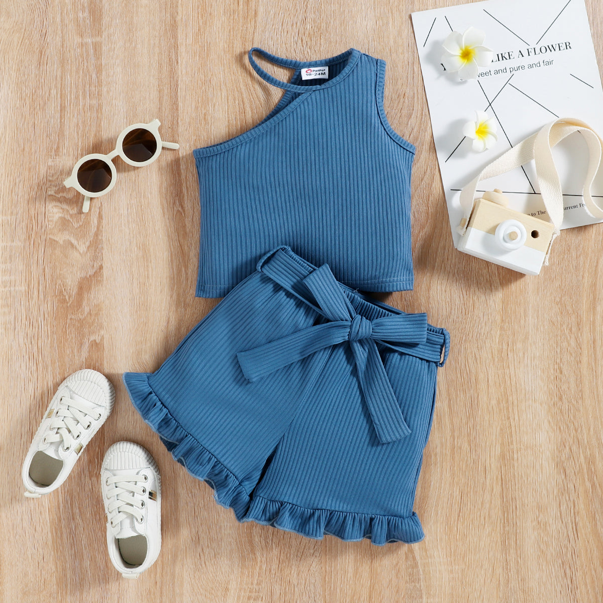 Blue Ribbed shorts and one strap top with Belt